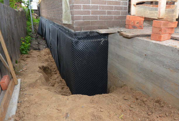 Happy homeowners after waterproofing job in Cook Springs